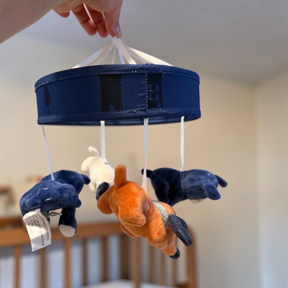 The Peanutshell Puppy Dog Crib Mobile Navy Blue Orange White Plush Nursery Decor